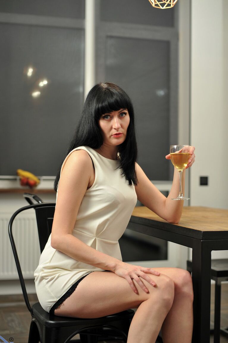 21P Raven-haired MILF Nimfa squeezes her boobs & flaunts her holes in a solo