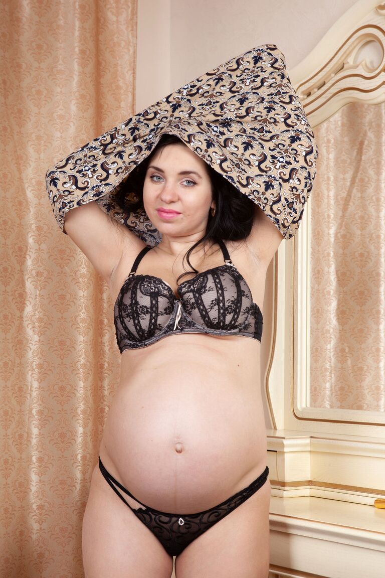 16P Over 30 pregger Tanita holds her swollen breasts after completely disrobing