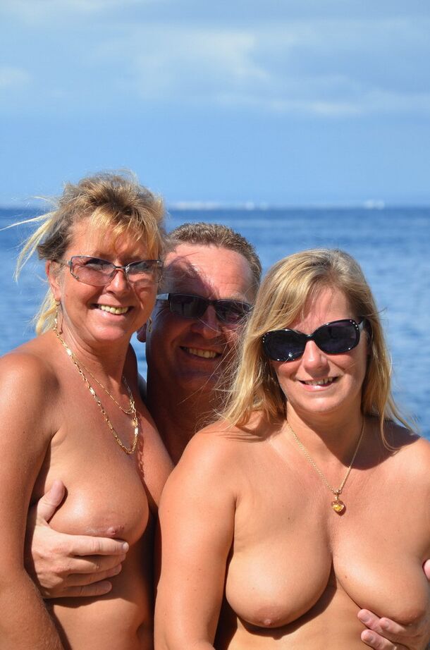 20P Two blonde women with saggy tits enjoy hot suck and fuck in beach threesome