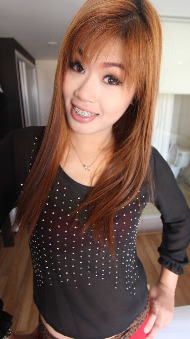 15P Chinese redhead Ming shows her braces before a POV fuck begins