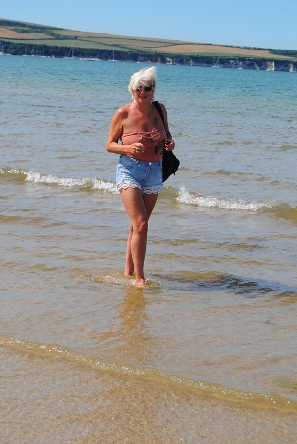 20P Older platinum blonde Dimonty takes a dip in the ocean while totally naked