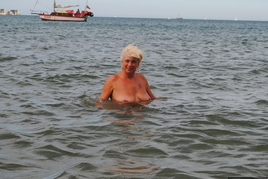 20P Older platinum blonde Dimonty takes a dip in the ocean while totally naked