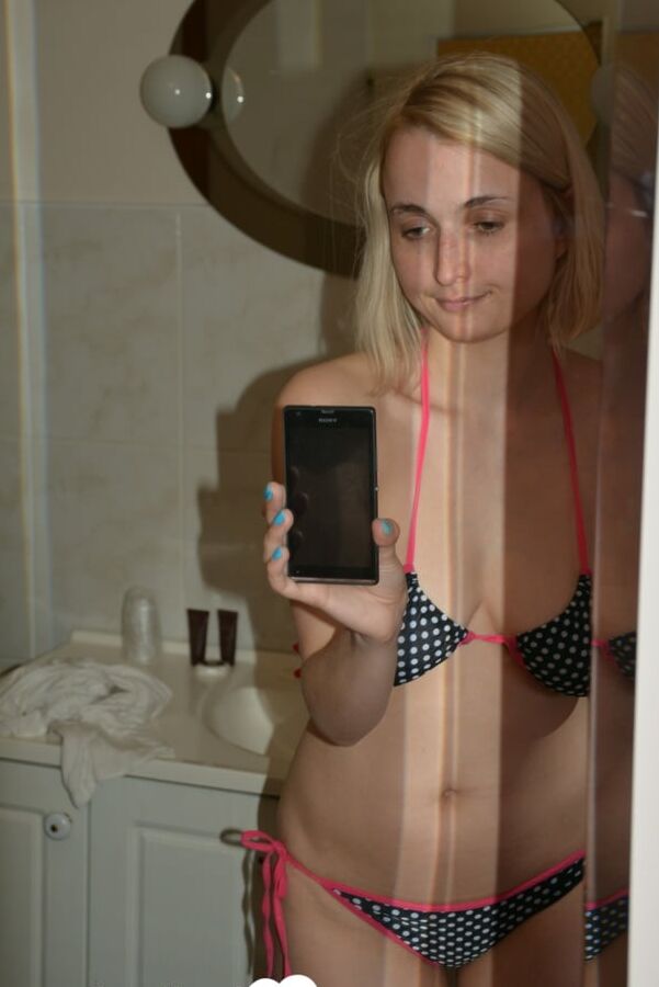 13P Hot blonde babe shows her big tits in the mirror after a day at the beach