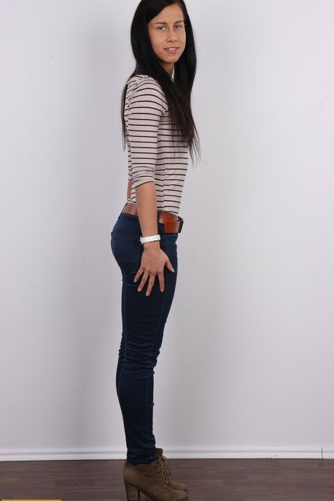 20P Brunette amateur Veronika stands straight and tall with and without clothes