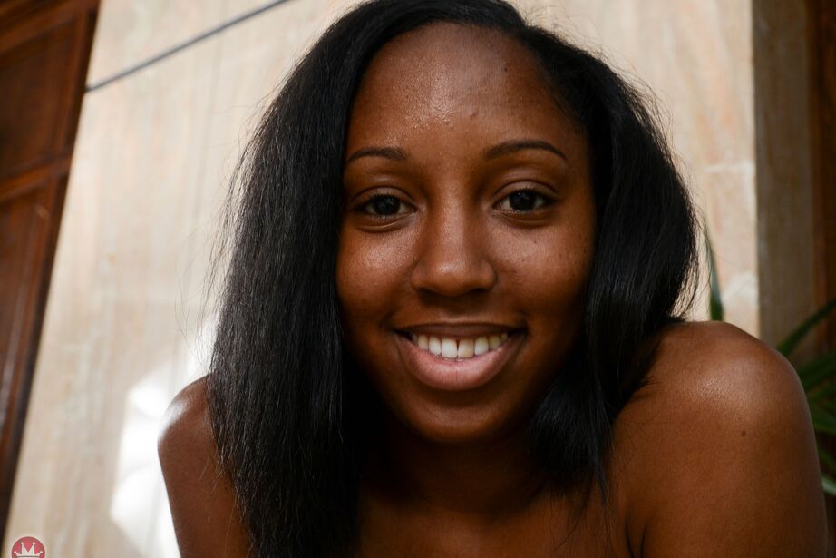 16P Black amateur Brie Dawn has a nice smile on her while showing her pink vagina