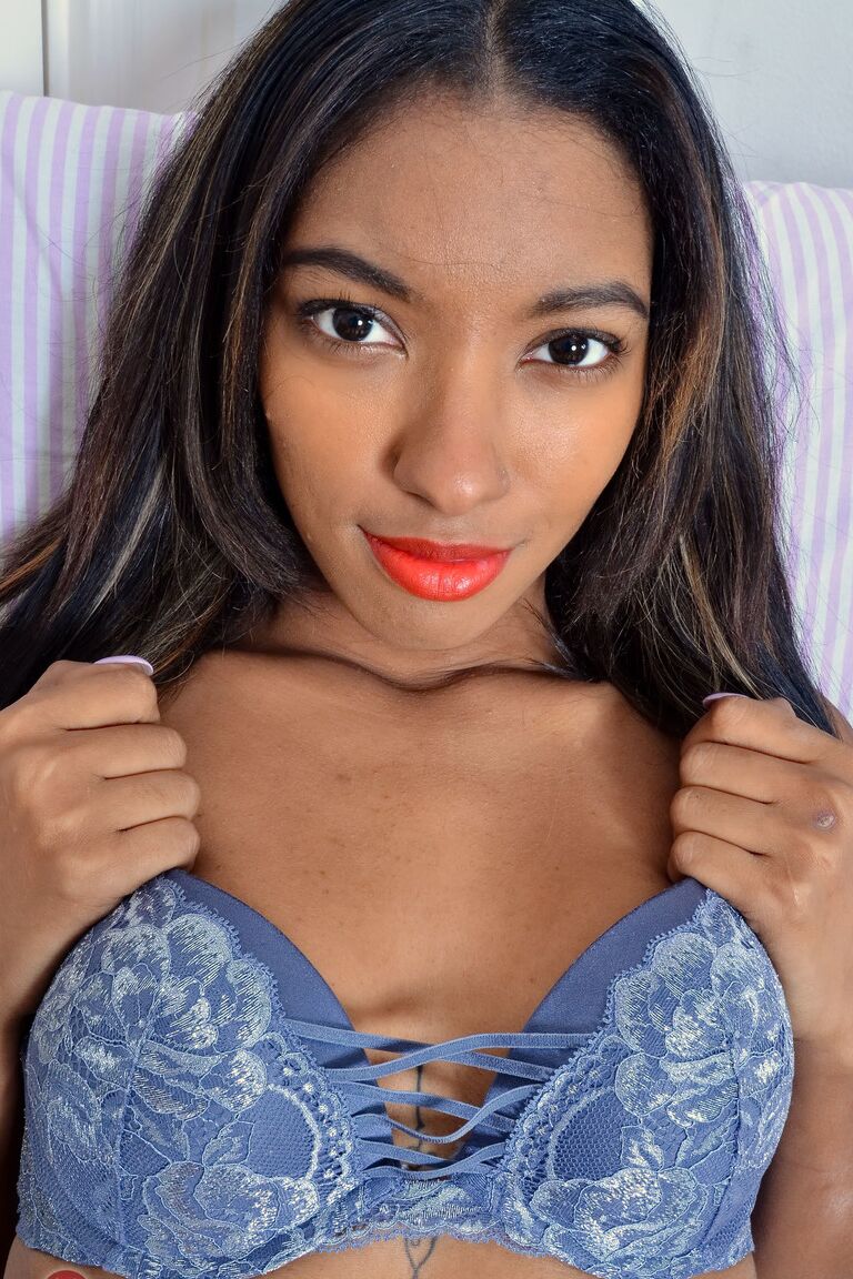 21P Black babe Raven Wylde exposes her tiny tits and amazing butt in heels