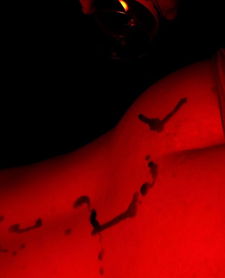 20P Amateur BBW Inked Oracle is covered in wax with her pantyhose pulled down
