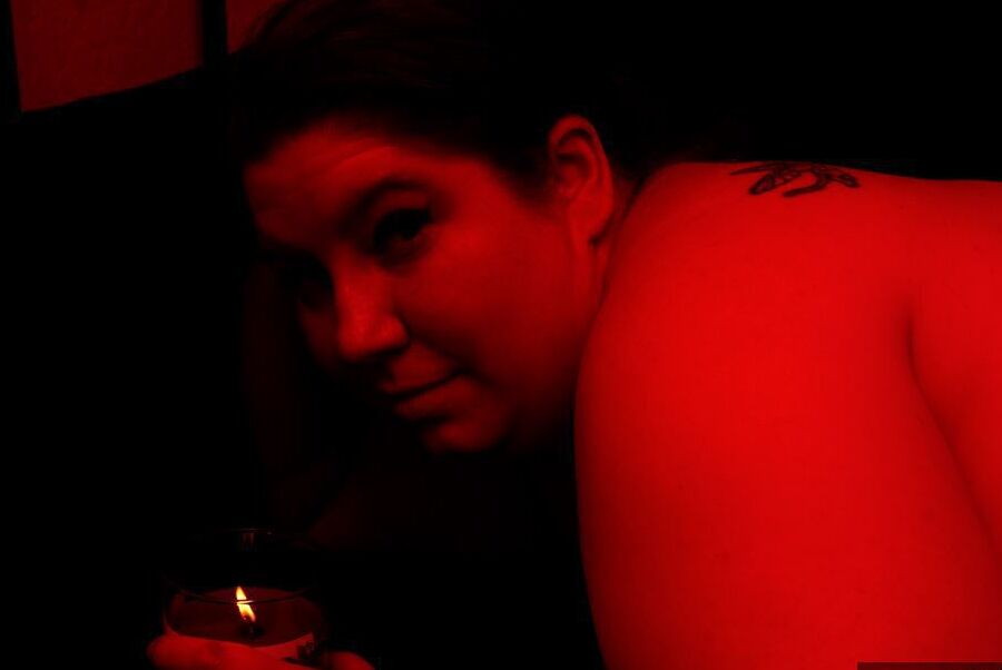 20P Amateur BBW Inked Oracle is covered in wax with her pantyhose pulled down