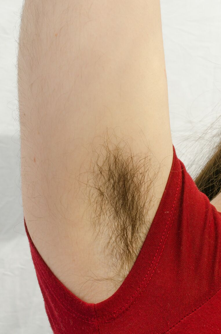 21P Hairy brunette Kisa Fae proudly shows her unshaved armpits and furry crotch