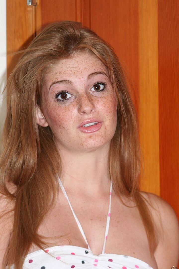 16P Redhead with freckles on her face makes her nude debut inside her front door