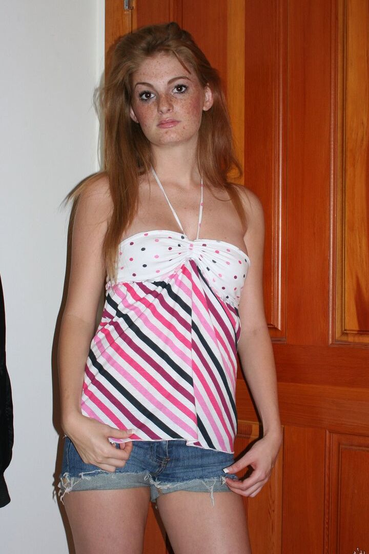 16P Redhead with freckles on her face makes her nude debut inside her front door