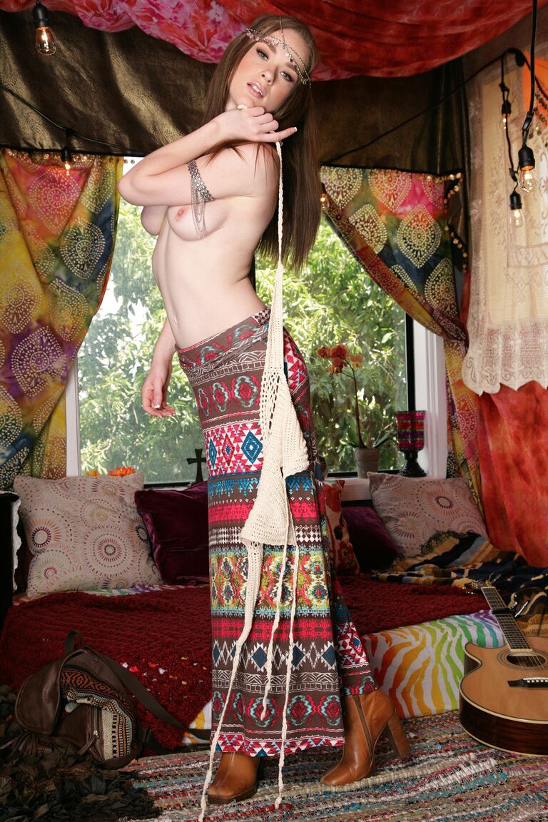 17P Redhead hippie babe Penny Brooks strips her clothes to bare tiny tits