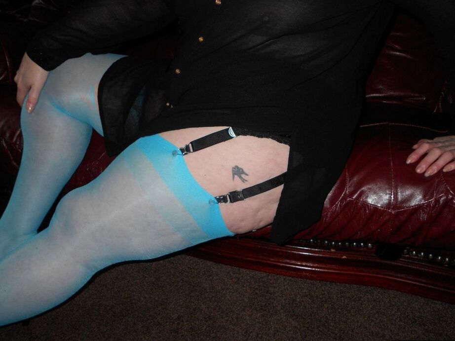 20P Older redhead Valgasmic Exposed exposes herself while in garters & blue nylons