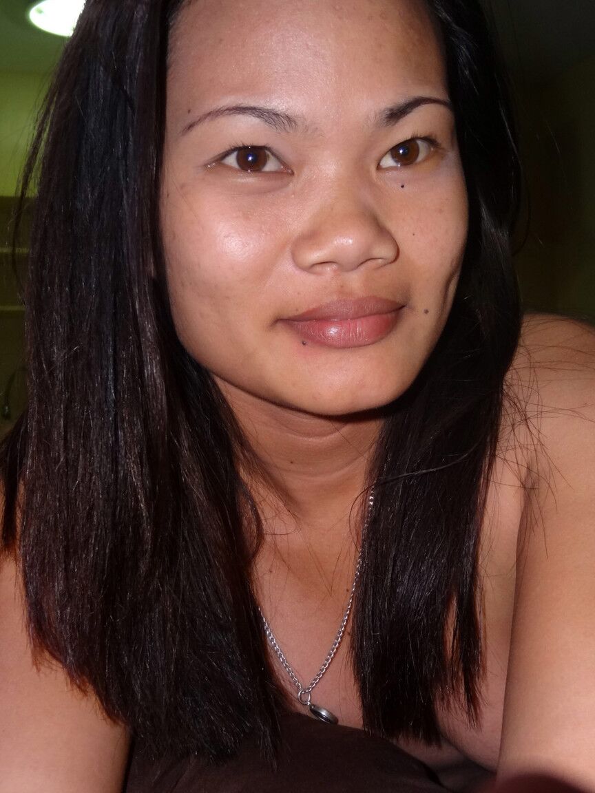 15P Asian amateurs Leann and Irish have sex on a bed with a foreigner