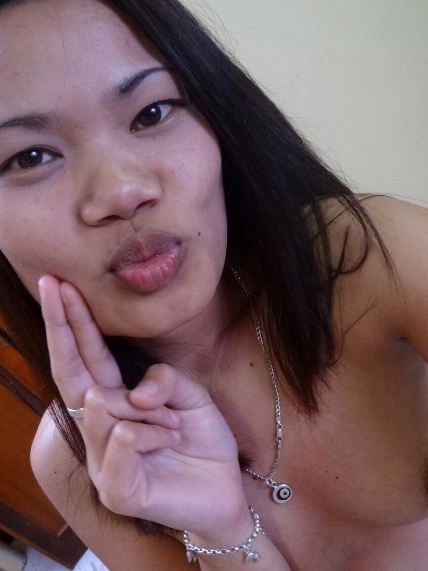 15P Asian amateurs Leann and Irish have sex on a bed with a foreigner