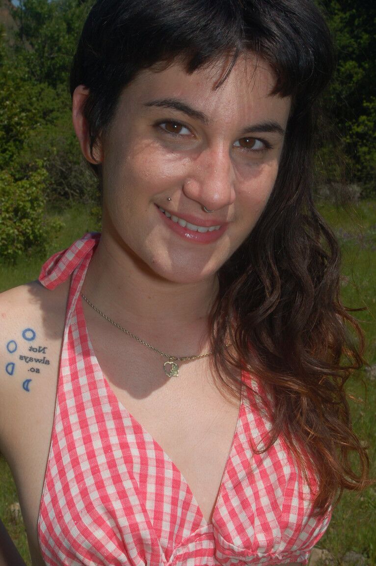21P Brunette honey Joey Minx displays her big bum and hairy pussy in nature