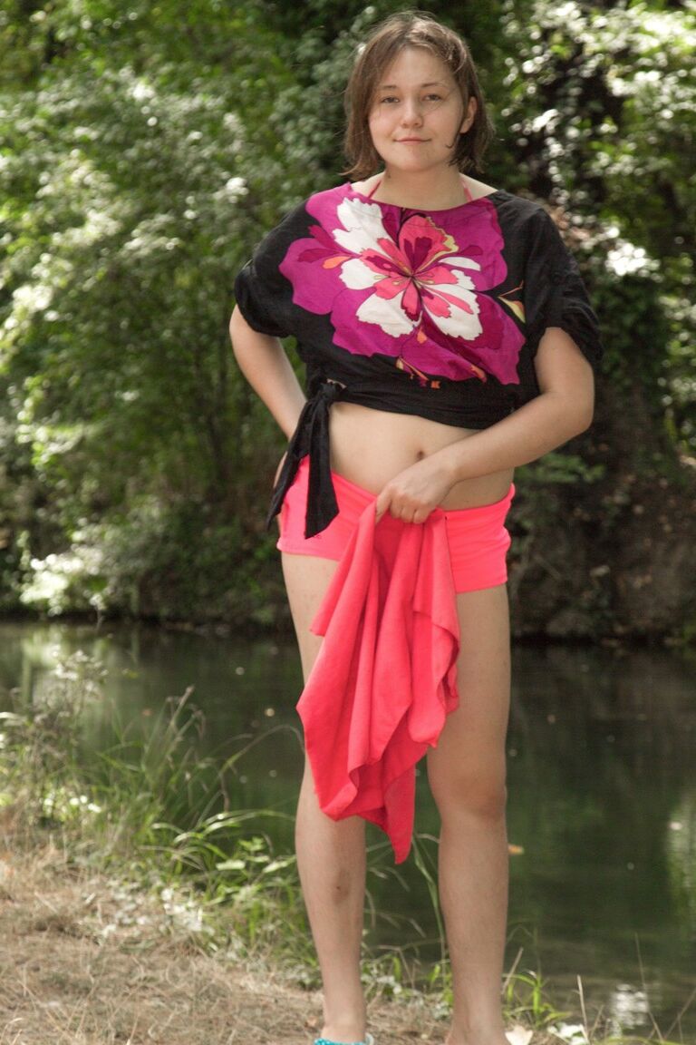 21P Brunette teen with tiny tits Clarissa exposes her hairy armpits in the woods