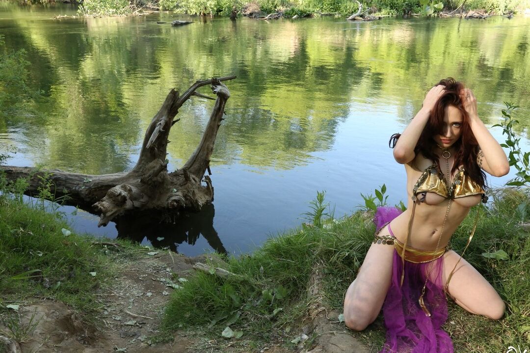 15P Amateur model Lily Xo sets her hot ass free off belly dance attire by a river
