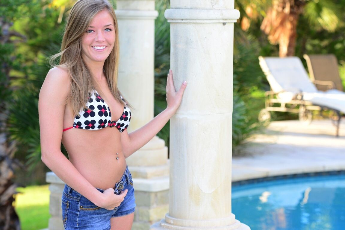 15P Cute teen Sophia Wood drops her shorts by the pool to toy with a vibrator