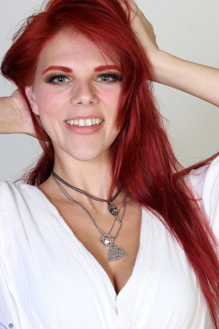 16P Natural redhead Devyn Lux strips to her heels before toying her pink pussy
