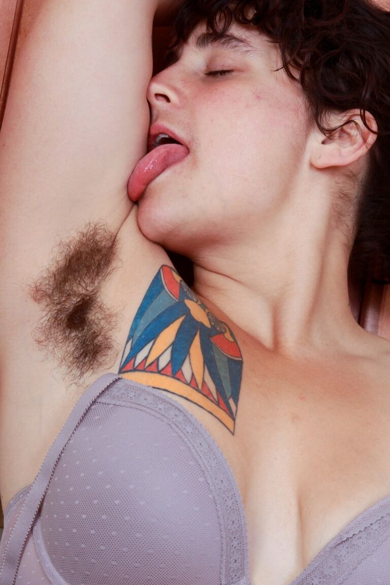 21P Filthy housewife Valerie teases with her hairy crotch and armpits in a kitchen