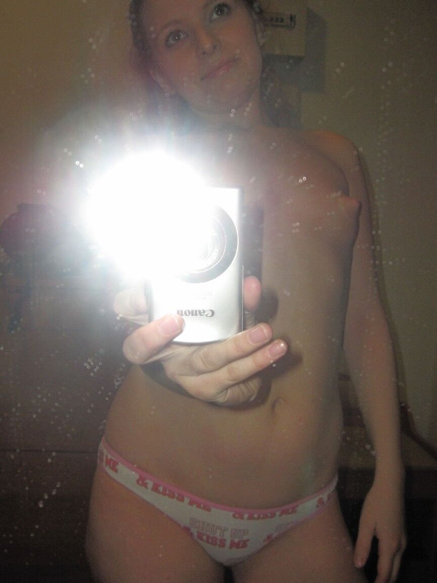 21P Innocent teen Kira posing topless in panties and taking selfies