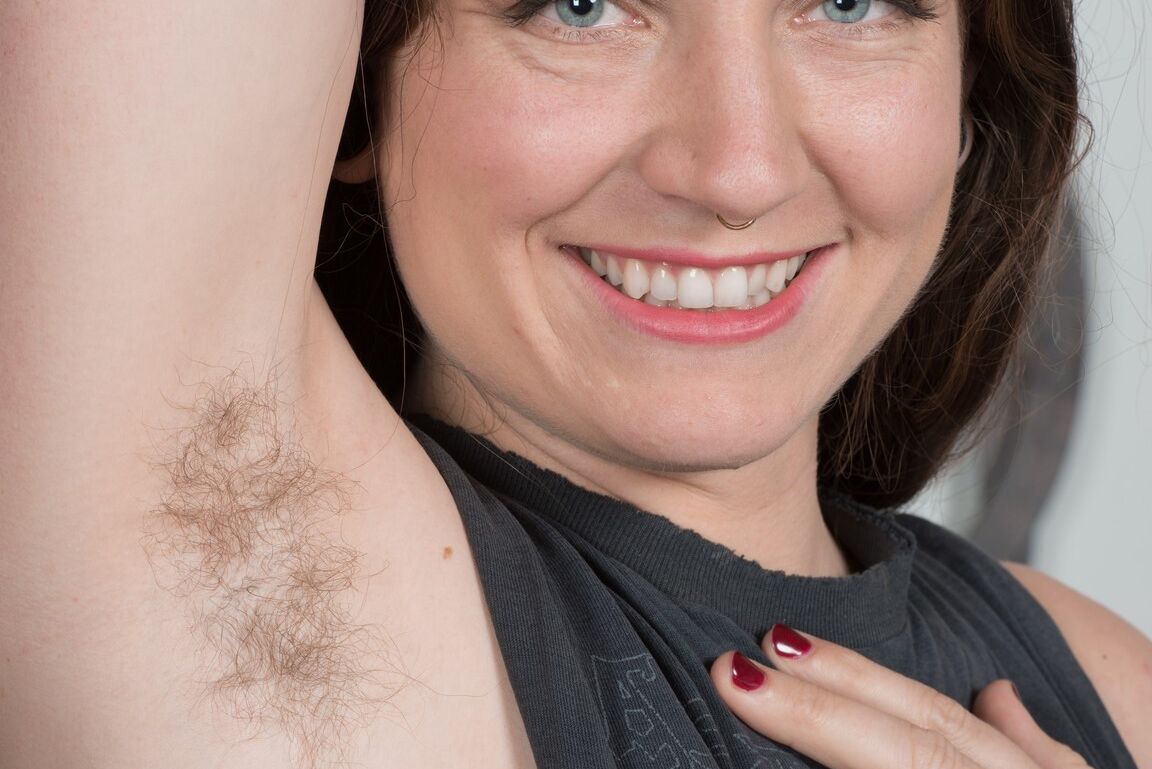 17P Cute brunette Mahonia teases with her hairy twat after solo striptease