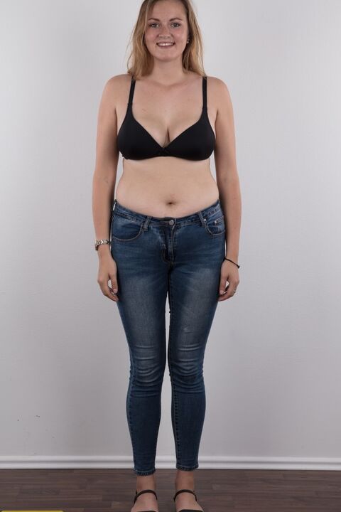 20P Chubby teen stands fully clothed before doing the same without any clothes on