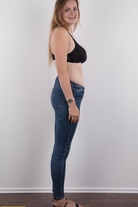 20P Chubby teen stands fully clothed before doing the same without any clothes on
