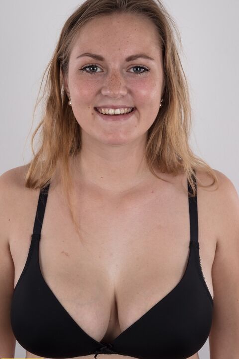 20P Chubby teen stands fully clothed before doing the same without any clothes on