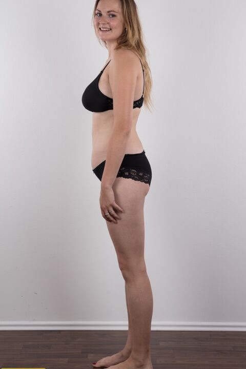 20P Chubby teen stands fully clothed before doing the same without any clothes on