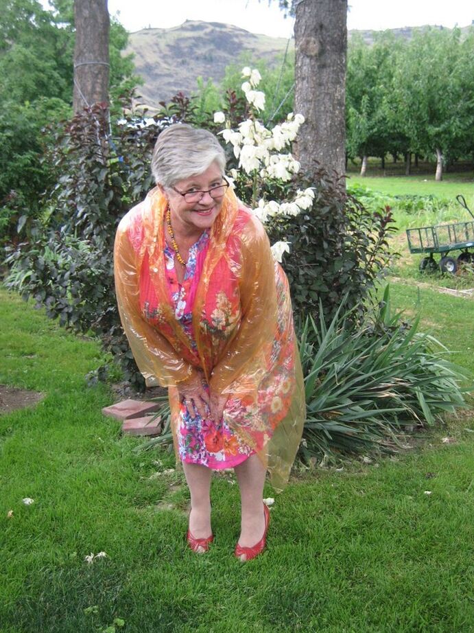 20P Short haired nan Girdle Goddess bares saggy tits and she removes a girdle