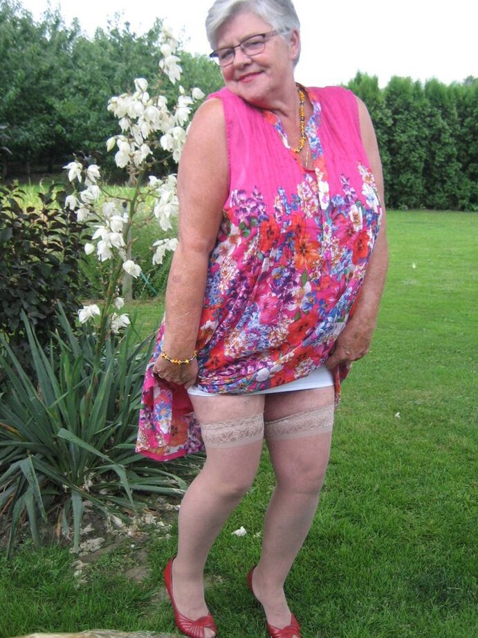 20P Short haired nan Girdle Goddess bares saggy tits and she removes a girdle