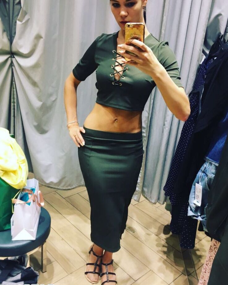 12P Amateur model Lovenia Lux takes clothed and topless selfies