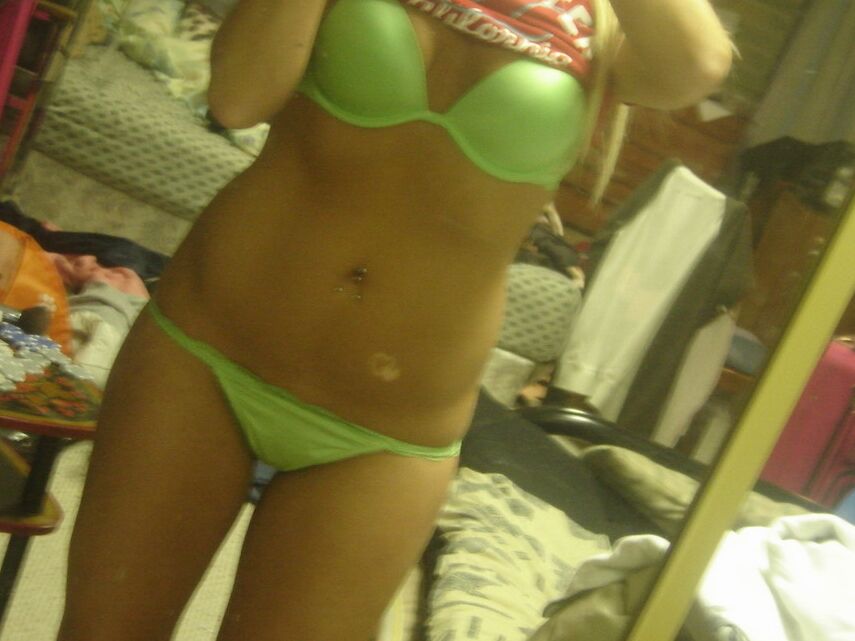 12P Teens tight pussy is barely covered by her green thong