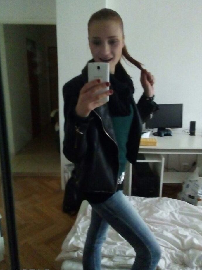 12P Young redhead Radka takes clothed and topless selfies around her place