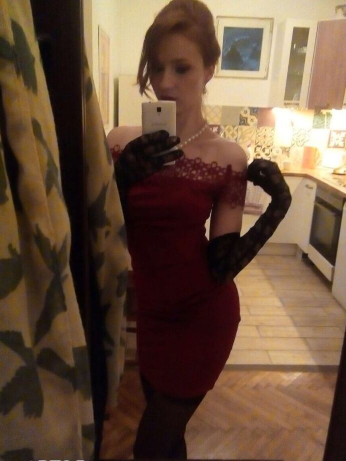 12P Young redhead Radka takes clothed and topless selfies around her place