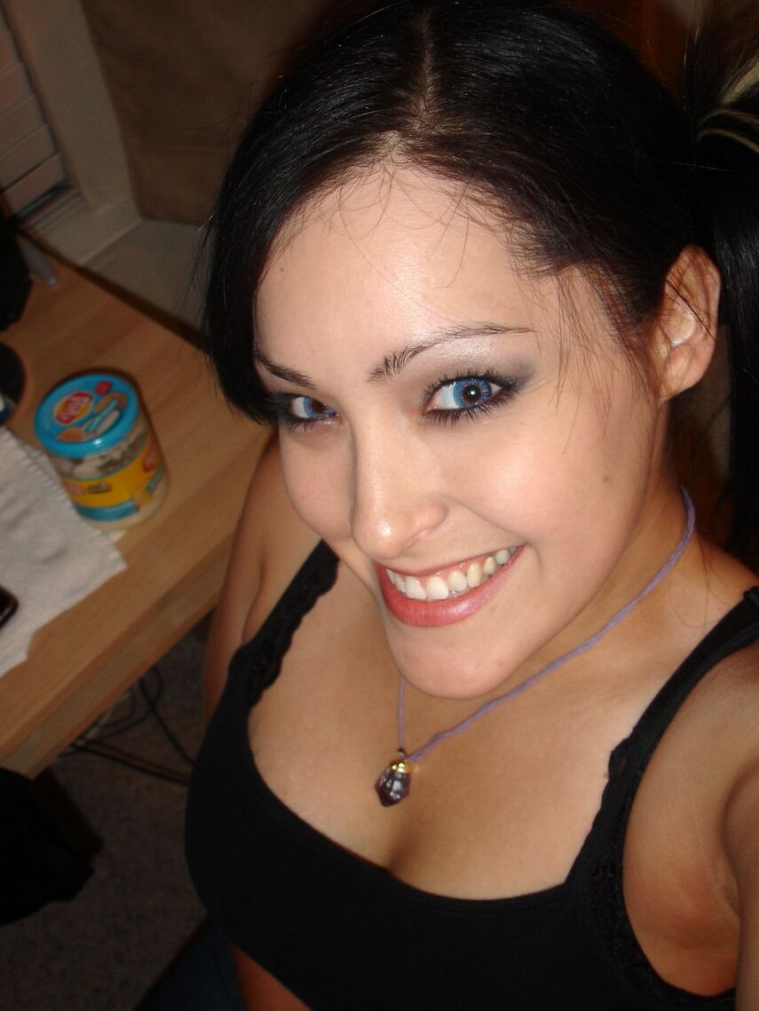 12P Kitty pulls down her shirt to give a view of her huge tits