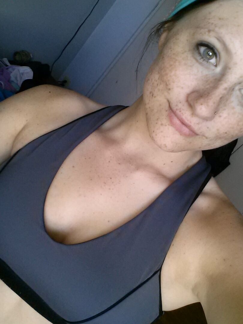 12P Pierced amateur Freckles takes self shot posing in shorts & sexy panties