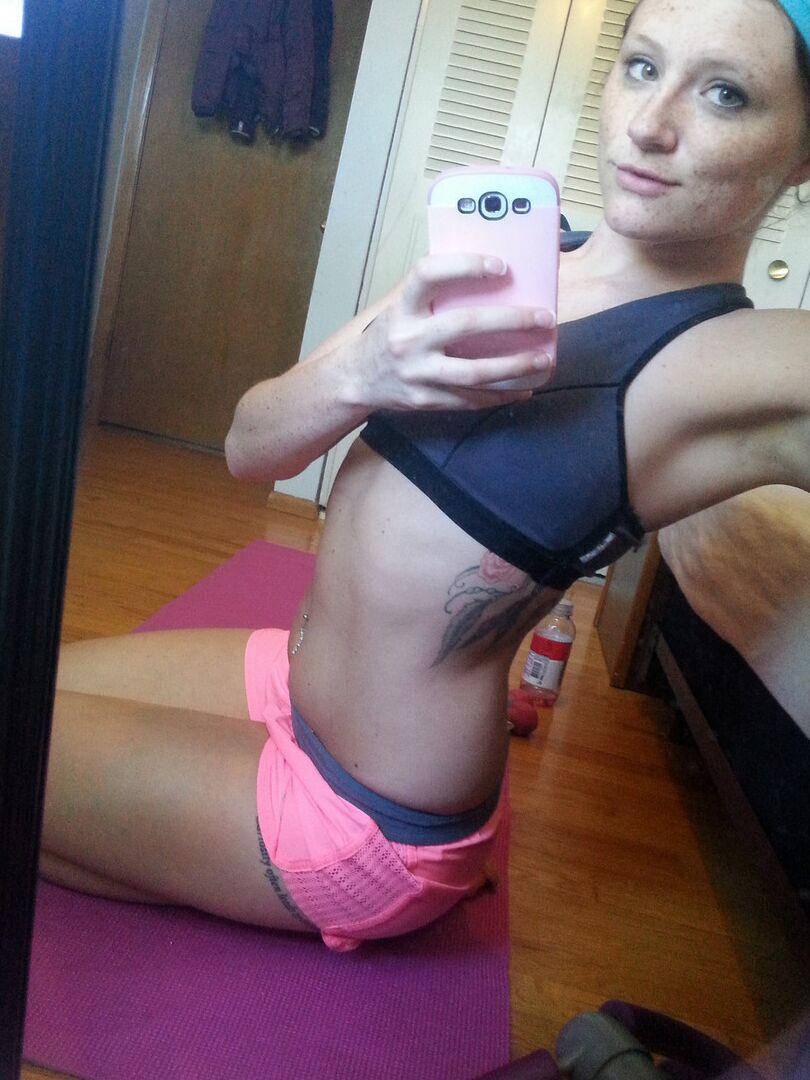 12P Pierced amateur Freckles takes self shot posing in shorts & sexy panties