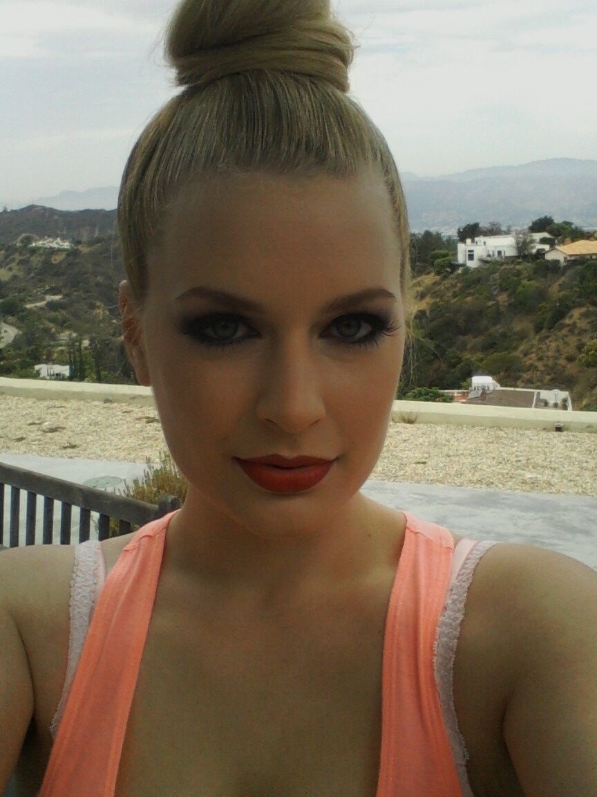 14P Big boobed amateur is joined by a girlfriend during one of her self shots