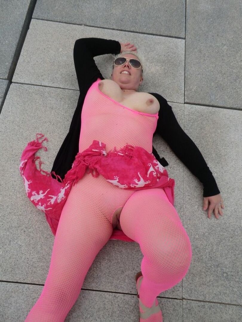 16P Aged lady Barby looses her big tits from a crotchless bodystocking by the sea