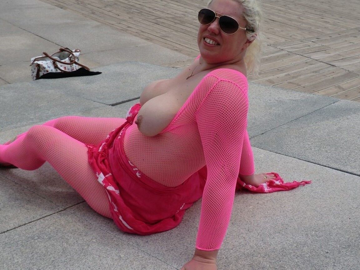 16P Aged lady Barby looses her big tits from a crotchless bodystocking by the sea