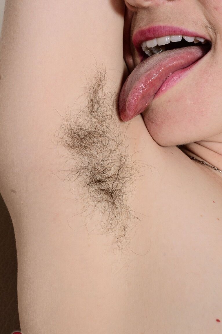 21P Kinky amateur Jane Vervain displays her bushy crotch and poses in fishnets