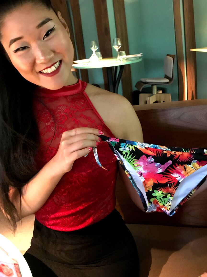 15P Asian chick in a black miniskirt gets undressed before POV sex on a bed