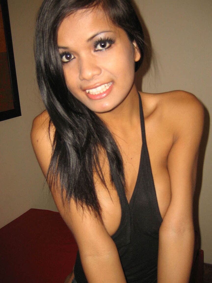10P Attractive Asian shemale Dada squeezing her incredible breasts at home