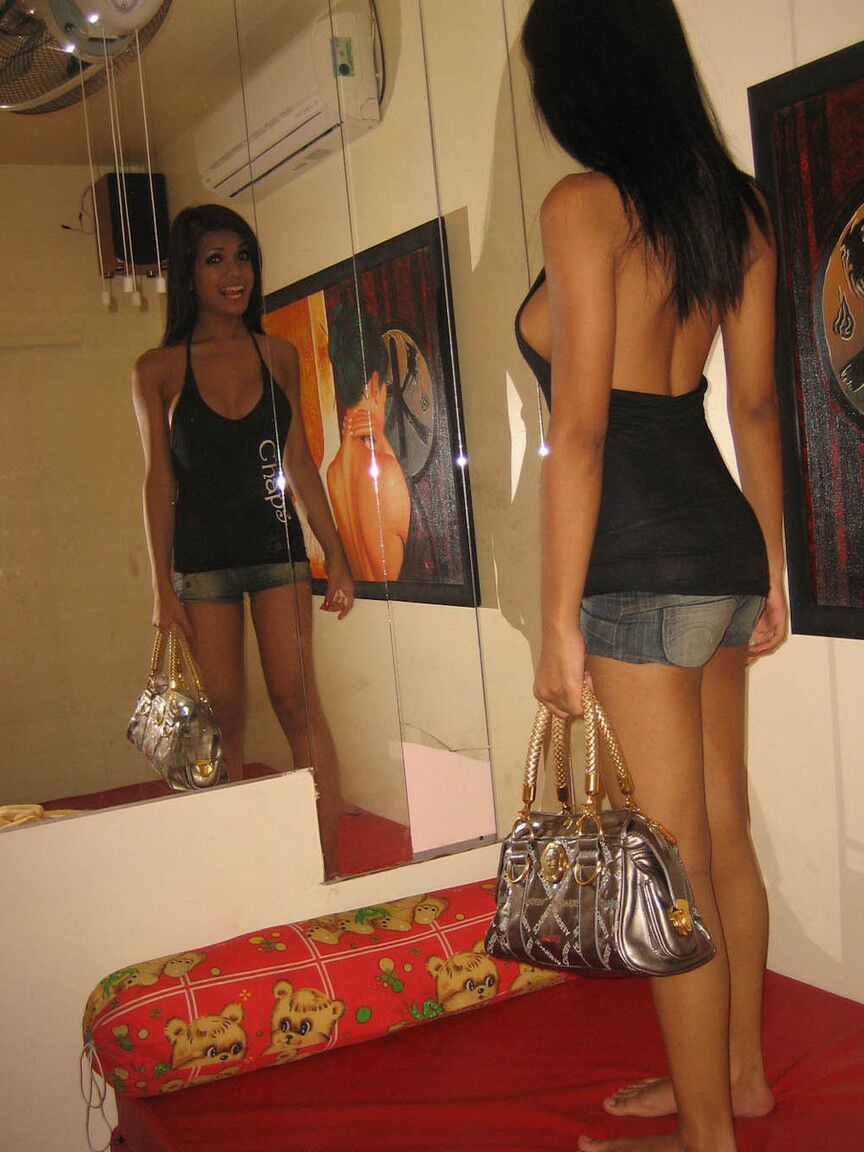 10P Attractive Asian shemale Dada squeezing her incredible breasts at home