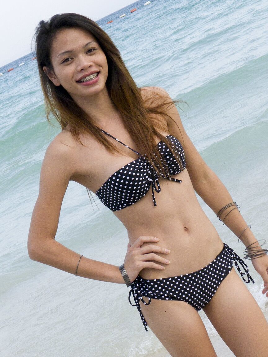 17P Lovely ladyboy with a pair of sexy tits Wicky getting ready for the beach