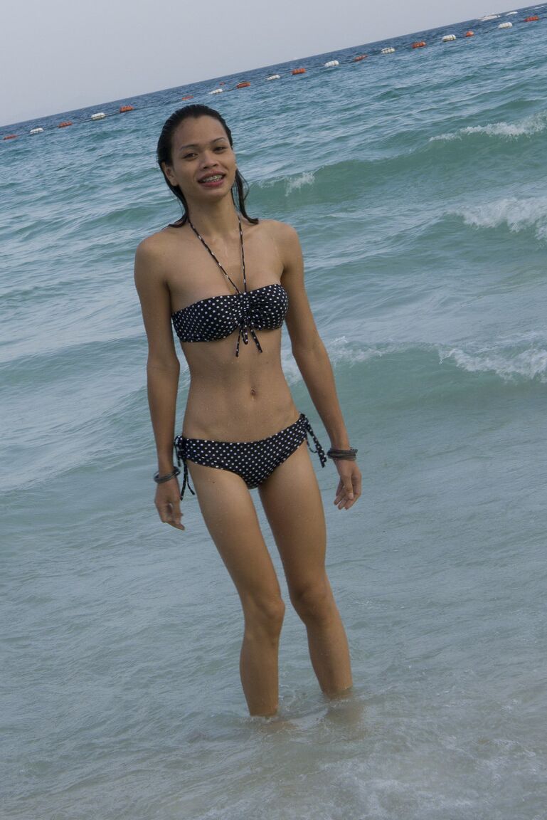 17P Lovely ladyboy with a pair of sexy tits Wicky getting ready for the beach