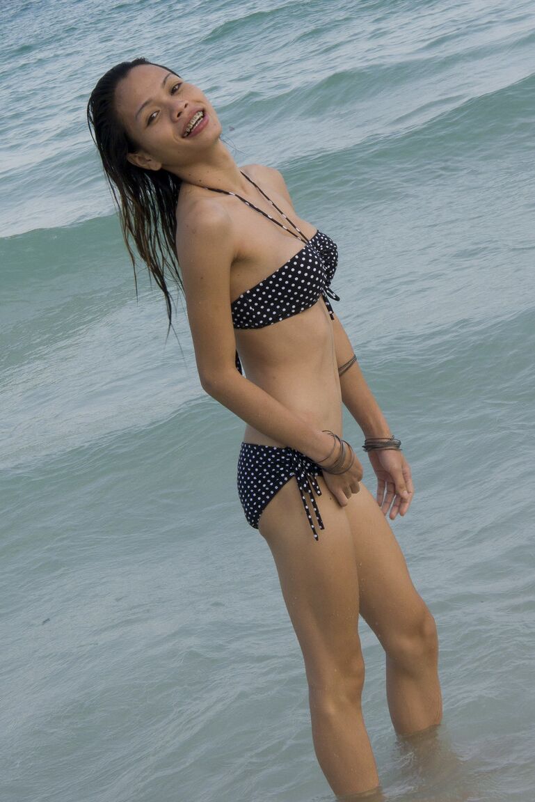 17P Lovely ladyboy with a pair of sexy tits Wicky getting ready for the beach